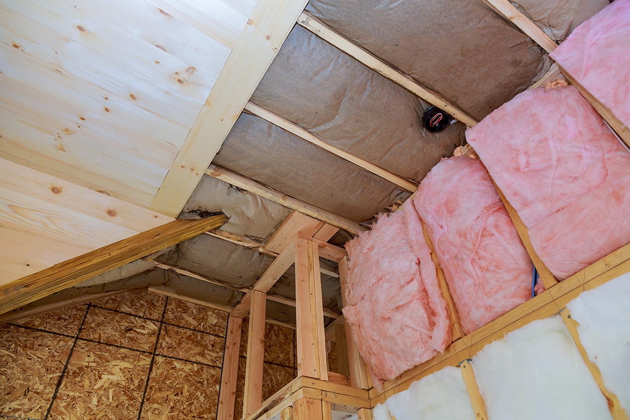 covering view layers pink fiberglass insulation cold barrier